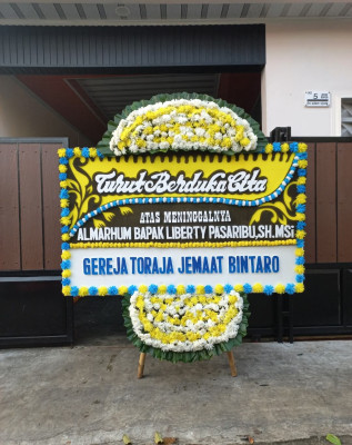 Papan Bunga Duka di Oba